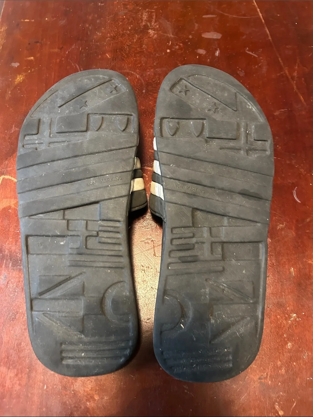 adidas Black Slides with White Three-Stripes